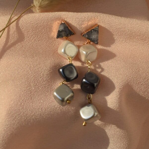Elegant Mystic Moss Necklace with black, white, and beige beads. Perfect for stylish accessories and.
