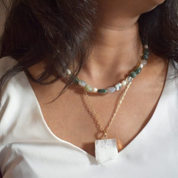 Layered necklace with moss green and white beads, featuring a white stone pendant. Perfect for boho.