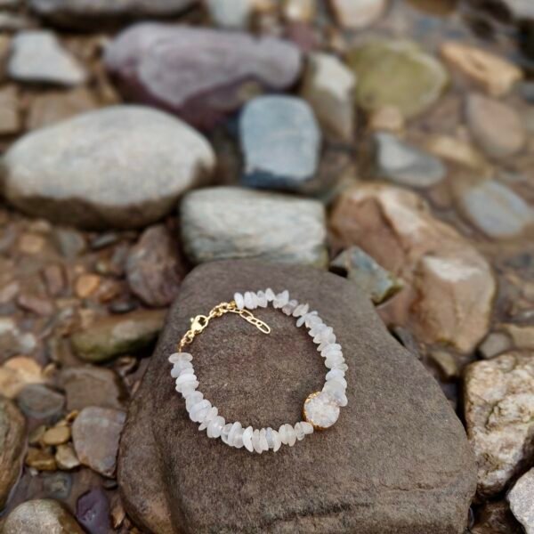 Bracelet with white beads on a rock, inspired by Serene Dream Bracelet. Perfect for elegant accessor.