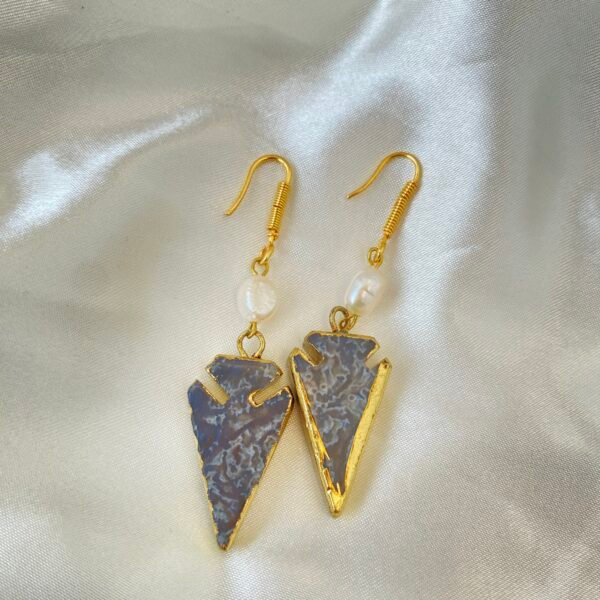 Elegant triangle dangle earrings with gold accents and pearl details for stylish accessories.