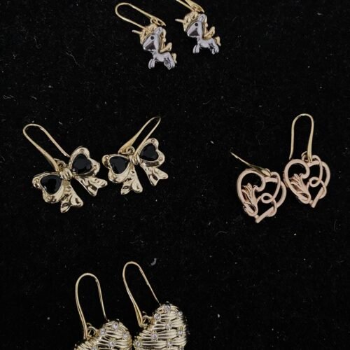 Elegant charm earrings featuring unicorn, heart, and textured ball designs for women. Perfect access.