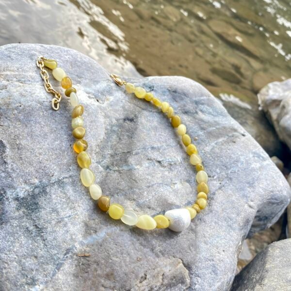 Elegant Pearl Pop Choker with yellow and white beads for stylish looks.